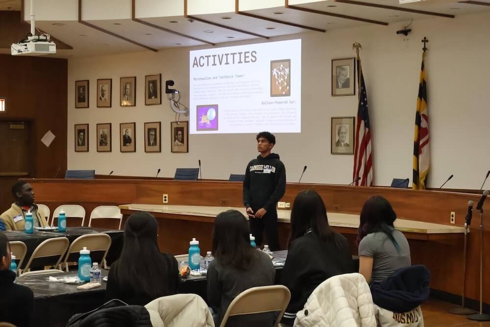 A student presents their BOLT Passion Project to a group of their peers.