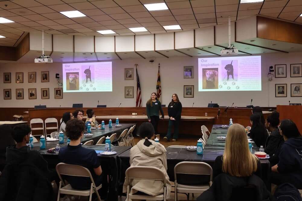 Two students present their BOLT Passion Project to a group of their peers.